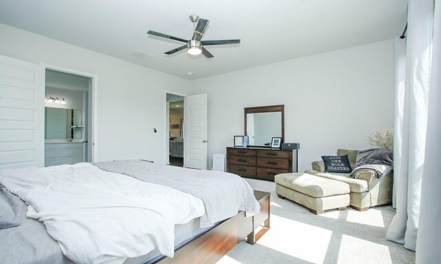 24618 Songlark Bend Dr, Tomball, TX 77375 - bedroom featuring connected bathroom, carpet, and a ceiling fan