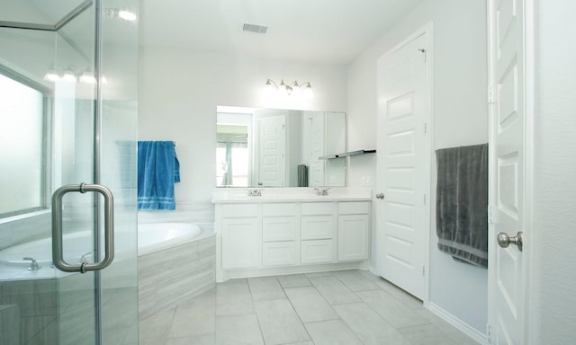 24618 Songlark Bend Dr, Tomball, TX 77375 - full bathroom with double vanity, a bath, tile patterned floors, and an enclosed shower