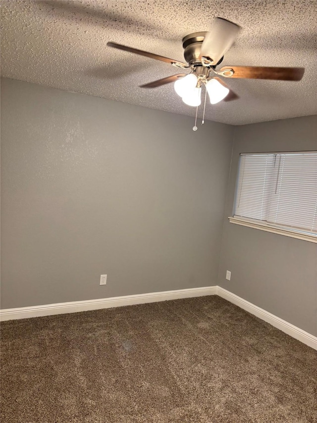 8818 Arbor Wood Dr, Houston, TX 77040 - carpeted empty room with a ceiling fan, baseboards, and a textured ceiling