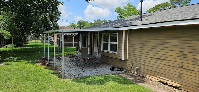 2401 Raspberry Ln, Pasadena, TX 77502 - view of yard featuring a patio