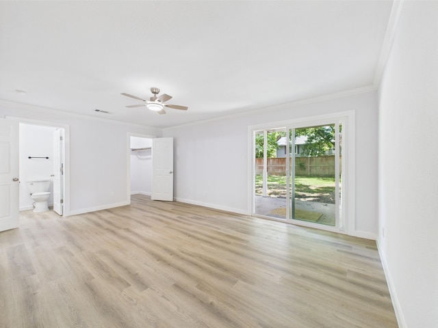 19503 Atascocita Shores Dr, Humble, TX 77346 - unfurnished bedroom featuring ornamental molding, access to exterior, light wood-type flooring, ensuite bath, and a ceiling fan