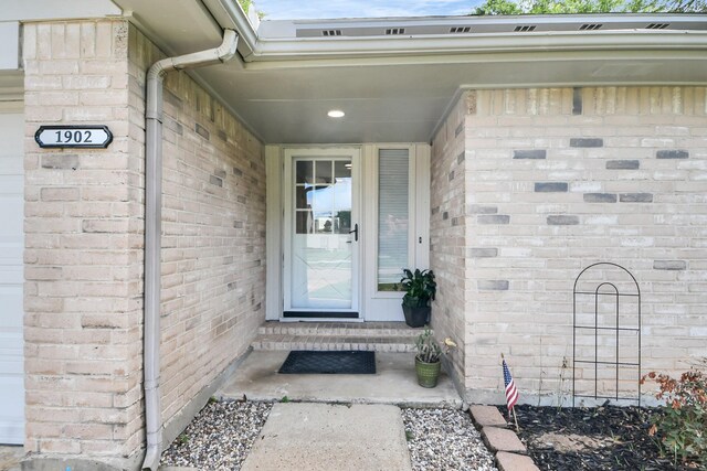 1902 Kings Arms Way, Katy, TX 77493 - doorway to property featuring brick siding