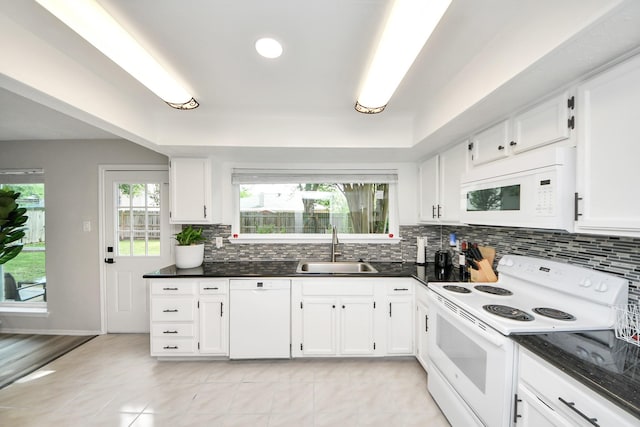 1902 Kings Arms Way, Katy, TX 77493 - kitchen featuring white appliances, decorative backsplash, white cabinetry, light tile patterned floors, and recessed lighting