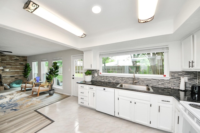 1902 Kings Arms Way, Katy, TX 77493 - kitchen featuring dishwasher, plenty of natural light, and dark countertops
