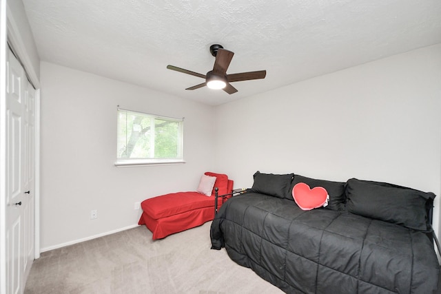 1902 Kings Arms Way, Katy, TX 77493 - bedroom with carpet, a closet, and a ceiling fan