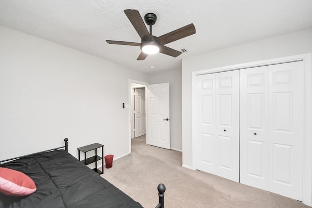 1902 Kings Arms Way, Katy, TX 77493 - carpeted bedroom featuring a closet and a ceiling fan
