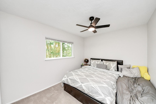 1902 Kings Arms Way, Katy, TX 77493 - carpeted bedroom featuring baseboards and ceiling fan