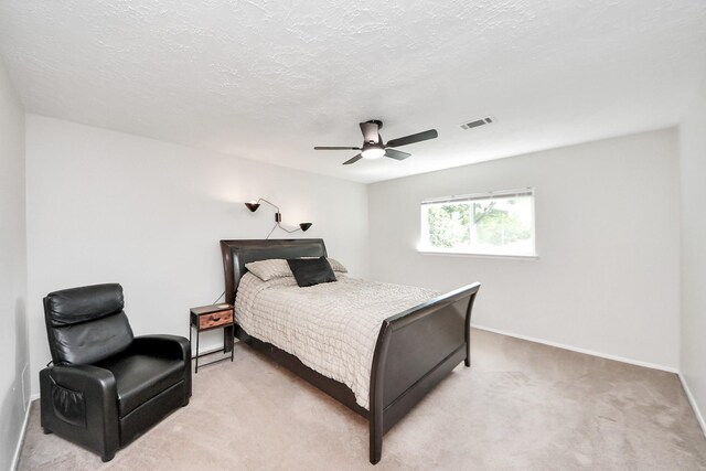 1902 Kings Arms Way, Katy, TX 77493 - bedroom featuring light colored carpet and ceiling fan