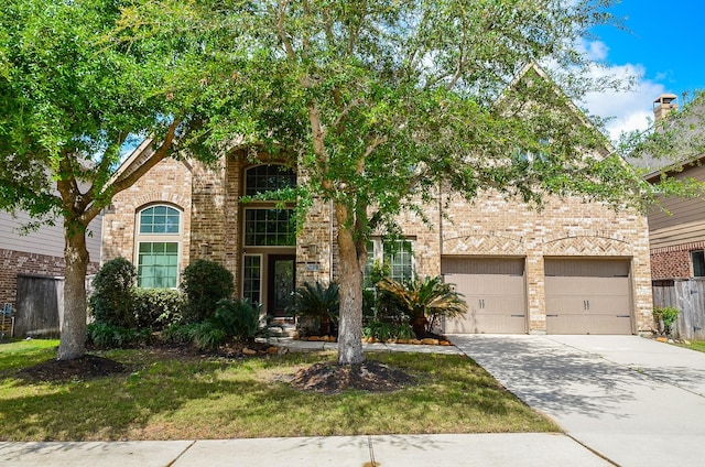 9819 St Romain Dr, Katy, TX 77494 - view of front facade featuring brick siding and concrete driveway