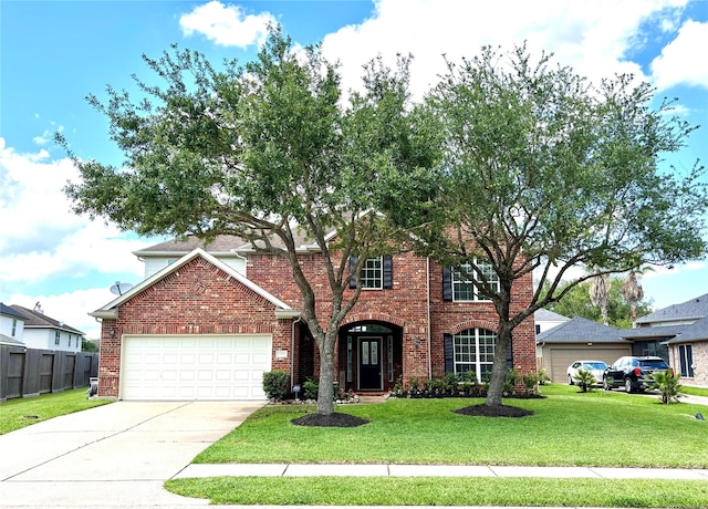 2528 Attwater Way, League City, TX 77573 - traditional-style house featuring brick siding, a garage, and driveway