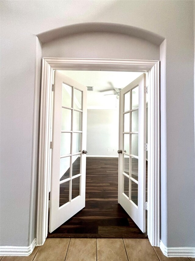 2528 Attwater Way, League City, TX 77573 - doorway to outside with french doors, tile patterned floors, baseboards, and a ceiling fan