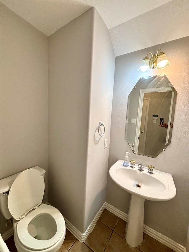 2528 Attwater Way, League City, TX 77573 - bathroom with tile patterned floors, toilet, and a sink