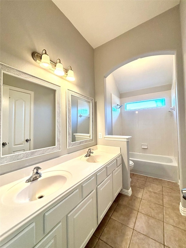 2528 Attwater Way, League City, TX 77573 - full bathroom with double vanity, tile patterned floors, toilet, and shower / bathtub combination