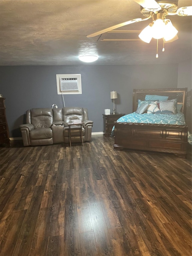 748 Queens Ct, Port Arthur, TX 77642 - bedroom featuring hardwood / wood-style floors, an AC wall unit, a ceiling fan, and baseboards