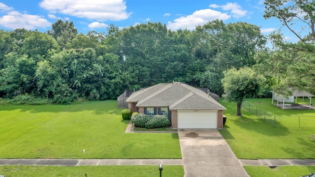 12821 Donegal Way, Houston, TX 77047 - view of front facade featuring brick siding, an attached garage, driveway, and roof with shingles