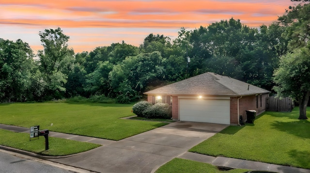 12821 Donegal Way, Houston, TX 77047 - view of front of house with brick siding, an attached garage, driveway, and a shingled roof