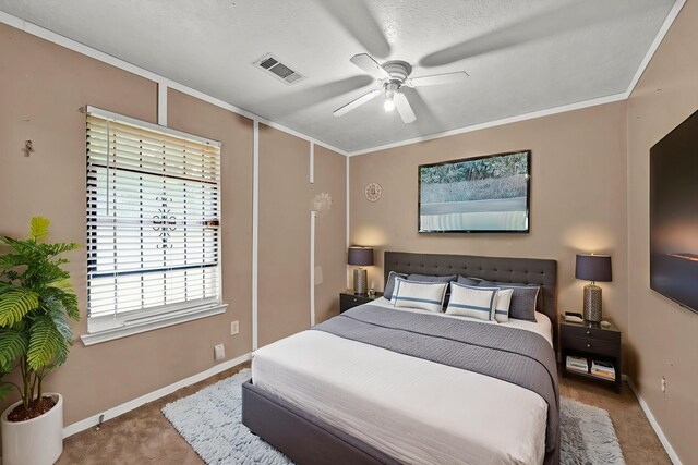 12821 Donegal Way, Houston, TX 77047 - bedroom with carpet flooring, ornamental molding, and a ceiling fan