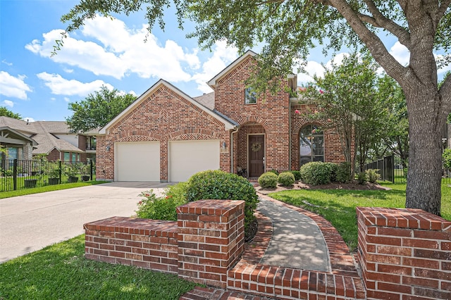 17207 Red Oak Bend Dr, Cypress, TX 77433 - traditional-style house featuring brick siding, concrete driveway, and an attached garage