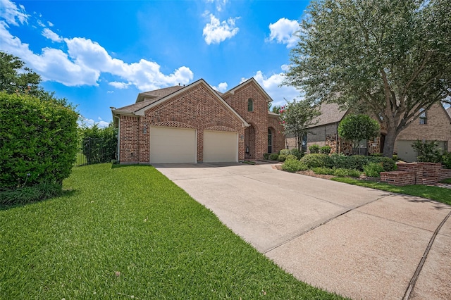 17207 Red Oak Bend Dr, Cypress, TX 77433 - traditional-style house with brick siding, an attached garage, driveway, and roof with shingles
