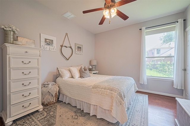 17207 Red Oak Bend Dr, Cypress, TX 77433 - bedroom with light wood finished floors, baseboards, and ceiling fan