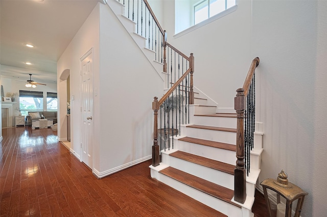 17207 Red Oak Bend Dr, Cypress, TX 77433 - stairs with wood finished floors, recessed lighting, a ceiling fan, and baseboards
