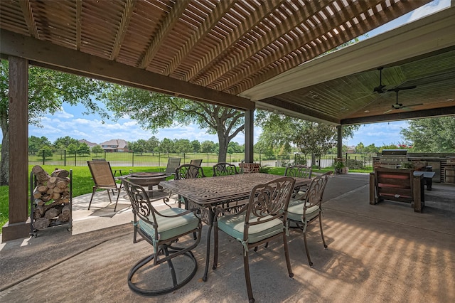 17207 Red Oak Bend Dr, Cypress, TX 77433 - view of patio featuring outdoor dining space and ceiling fan