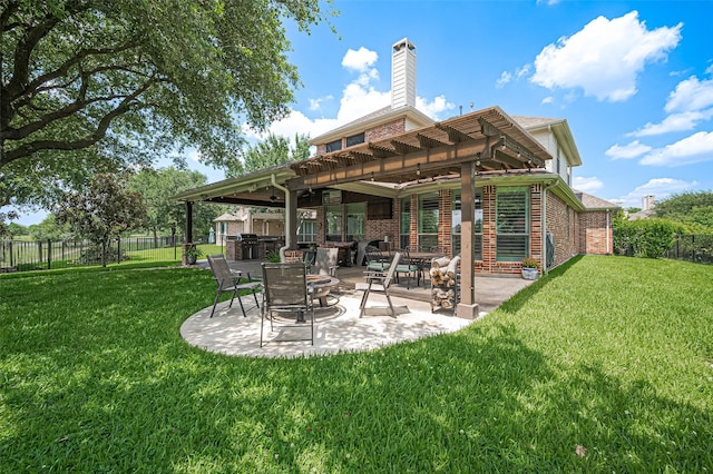 17207 Red Oak Bend Dr, Cypress, TX 77433 - rear view of property featuring a patio, a chimney, and brick siding