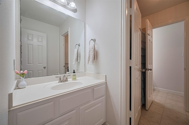 17207 Red Oak Bend Dr, Cypress, TX 77433 - bathroom featuring vanity and tile patterned flooring