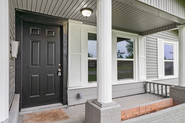 54 Lantana Ct, Lake Jackson, TX 77566 - doorway to property featuring a porch