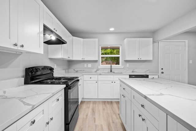 54 Lantana Ct, Lake Jackson, TX 77566 - kitchen featuring electric range, under cabinet range hood, white cabinetry, and recessed lighting