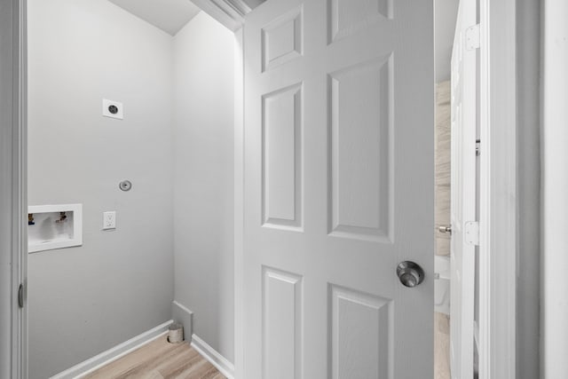 54 Lantana Ct, Lake Jackson, TX 77566 - washroom with electric dryer hookup, washer hookup, and light wood-style floors