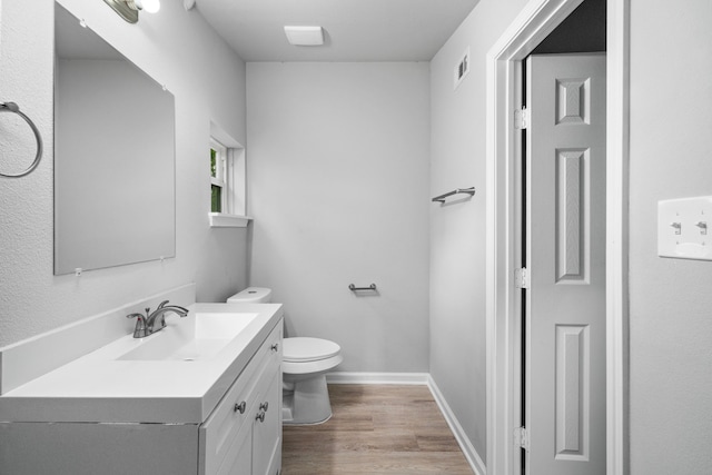 54 Lantana Ct, Lake Jackson, TX 77566 - bathroom featuring vanity and wood finished floors