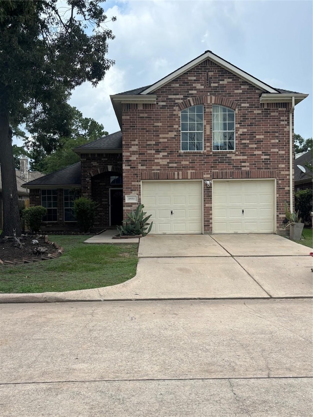 18918 Cypresswood Forest Ct, Spring, TX 77388 - view of front facade with brick siding, concrete driveway, an attached garage, and a front yard