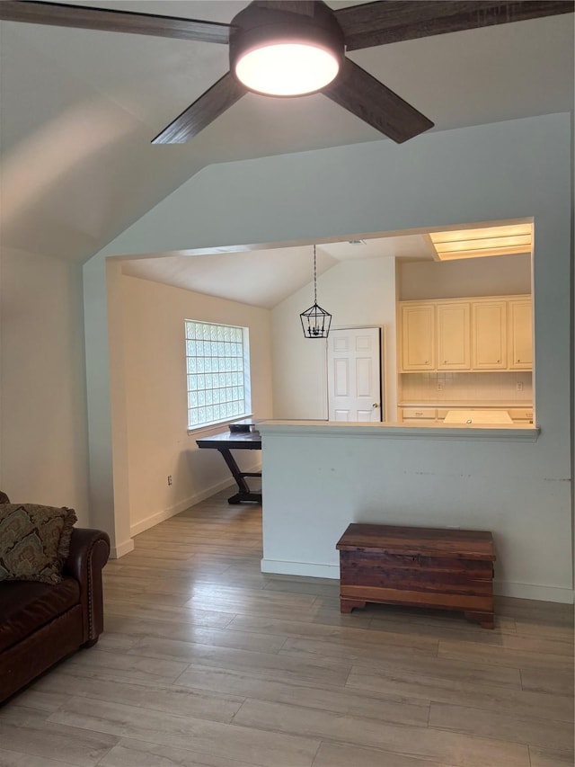 18918 Cypresswood Forest Ct, Spring, TX 77388 - living area featuring lofted ceiling, baseboards, a ceiling fan, and light wood finished floors