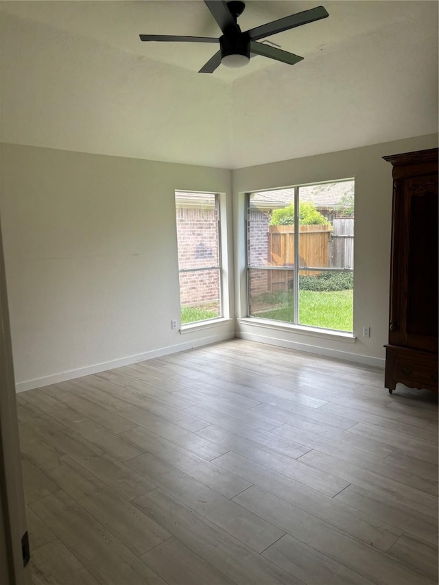 18918 Cypresswood Forest Ct, Spring, TX 77388 - empty room with baseboards, wood finished floors, and a ceiling fan