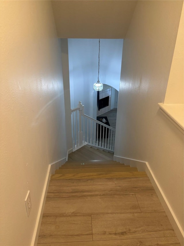 18918 Cypresswood Forest Ct, Spring, TX 77388 - stairway featuring wood finished floors and baseboards