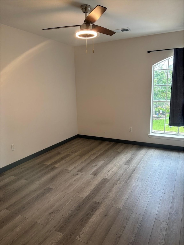 18918 Cypresswood Forest Ct, Spring, TX 77388 - unfurnished room with a ceiling fan, wood finished floors, and baseboards