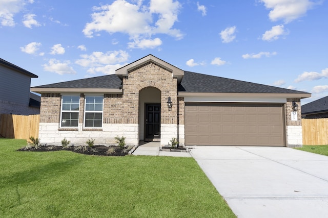 1503 Crete Is, Iowa Colony, TX 77583 - view of front facade with brick siding, an attached garage, driveway, and a shingled roof