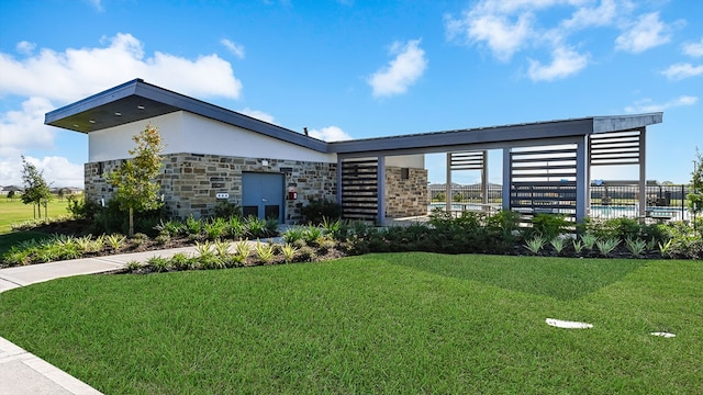 1503 Crete Is, Iowa Colony, TX 77583 - contemporary house featuring stone siding
