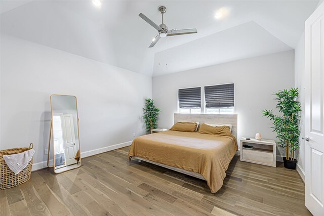 2414 Hollister Rd, Houston, TX 77080 - bedroom with light wood finished floors, baseboards, a ceiling fan, and high vaulted ceiling