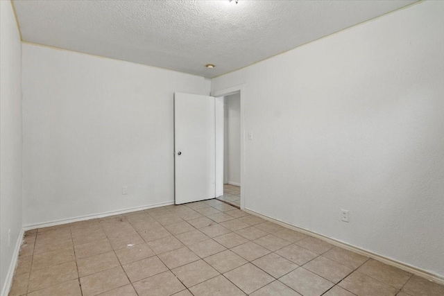 2905 Glenwood St, Beaumont, TX 77705 - unfurnished room with a textured ceiling