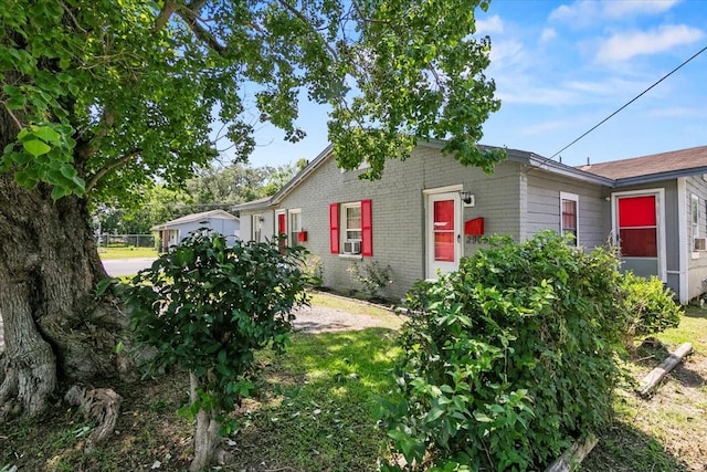2905 Glenwood St, Beaumont, TX 77705 - view of home's exterior featuring brick siding