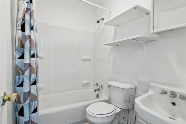 2905 Glenwood St, Beaumont, TX 77705 - bathroom featuring shower / tub combo, toilet, and a sink