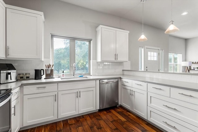 15202 Cavalier Canyon Dr, Lakeway, TX 78734 - kitchen with stainless steel appliances, a sink, backsplash, light countertops, and white cabinetry