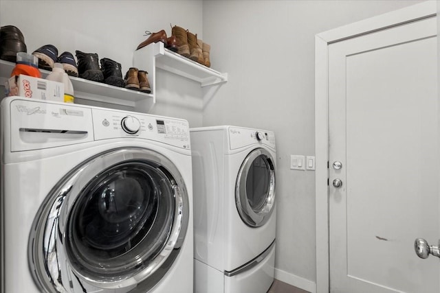 15202 Cavalier Canyon Dr, Lakeway, TX 78734 - laundry area with washer and dryer and baseboards