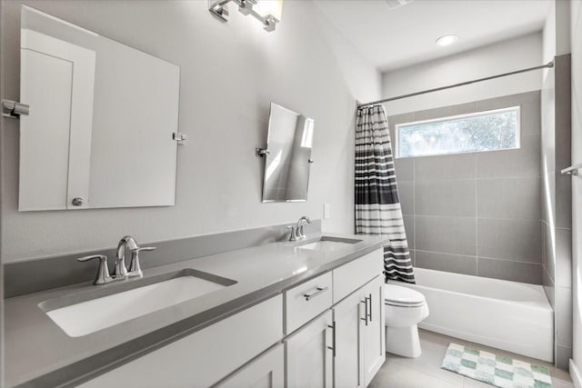 15202 Cavalier Canyon Dr, Lakeway, TX 78734 - bathroom with toilet, shower / bath combo with shower curtain, double vanity, and tile patterned floors
