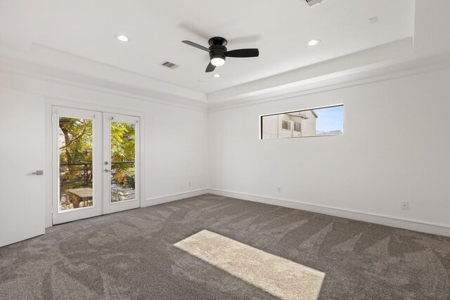 1205 Summer St Unit C, Houston, TX 77007 - carpeted empty room featuring ceiling fan, recessed lighting, baseboards, and a tray ceiling