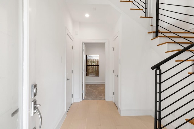 1205 Summer St Unit C, Houston, TX 77007 - foyer entrance with baseboards, stairway, and recessed lighting