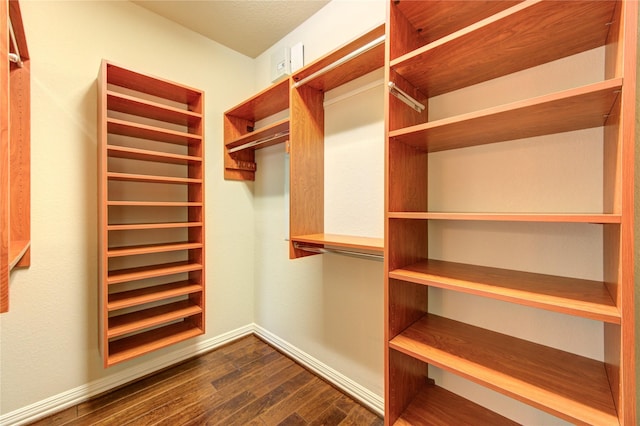 27107 Downing Park Blvd, Katy, TX 77494 - spacious closet featuring dark wood-style floors
