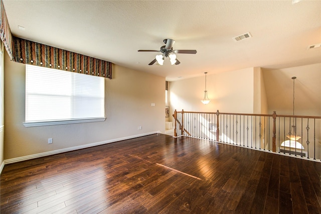 27107 Downing Park Blvd, Katy, TX 77494 - empty room with ceiling fan, hardwood / wood-style floors, and baseboards